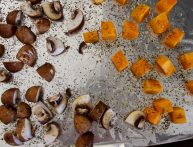 Quartered mushroom caps and bite-sized squash were roasted with salt, pepper, thyme and olive oil.