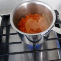 Cook carrots in salted/boiling water until crisp-tender. Drain.